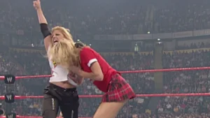 Stacy Keibler vs Trish Stratus Paddle On A Pole Spanking Match Results, Highlights, Winner & Video